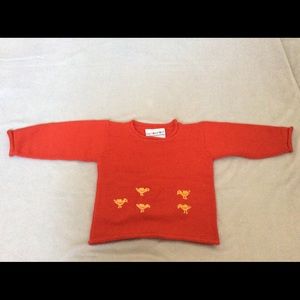 Infant sweater, tomato red, sized 1-2y